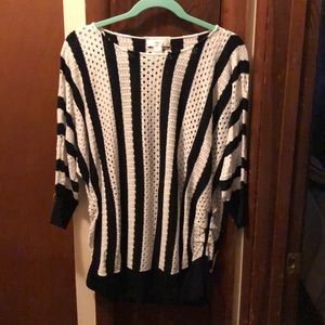 Black and white striped sweater with open area